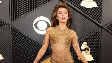 miley cyrus grammys dress video|miley cyrus grammys safety pin dress.